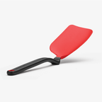 Dreamfarm Mini Chopula, a red silicone spatula with a flat edge and a black handle