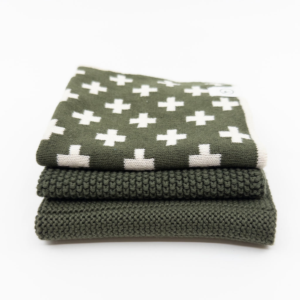 Ecovask dishcloth variety three pack in olive green, with a white cross print towel and knitted cloths