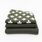 Ecovask dishcloth variety three pack in olive green, with a white cross print towel and knitted cloths