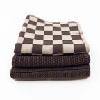 Ecovask mixed three pack of brown and beige check towels and knitted cloths, stacked