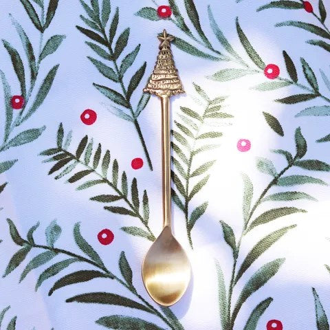 Old Mill Road gold Christmas tree teaspoon on a leaf and red berry patterned background