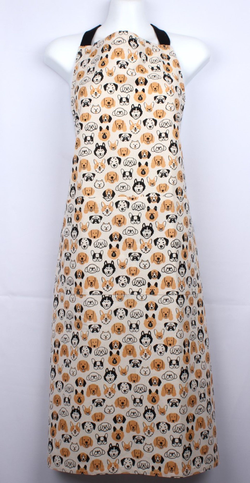 HotHouse Dog Look apron with a pattern of illustrated dog faces on tan, shown on a mannequin