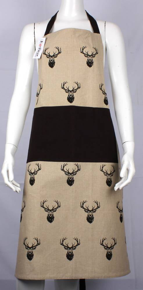 HotHouse cotton apron with a black stag head print on linen and a black band, shown on a mannequin