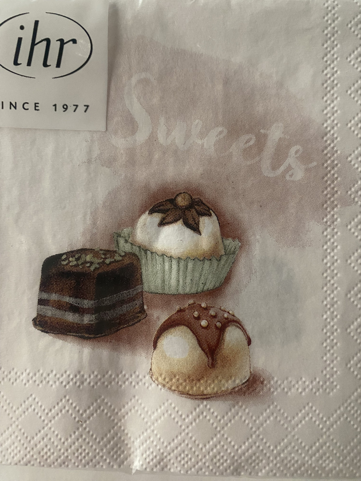 IHR Chocolates cocktail napkin with an illustrated Sweets pattern of petit fours