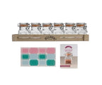 Kilner spice jar set of six clip-top jars on a wooden rack, with labels and a chalk pen