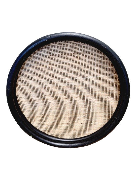 Linens & More round rattan tray with a woven cane base and a black rim