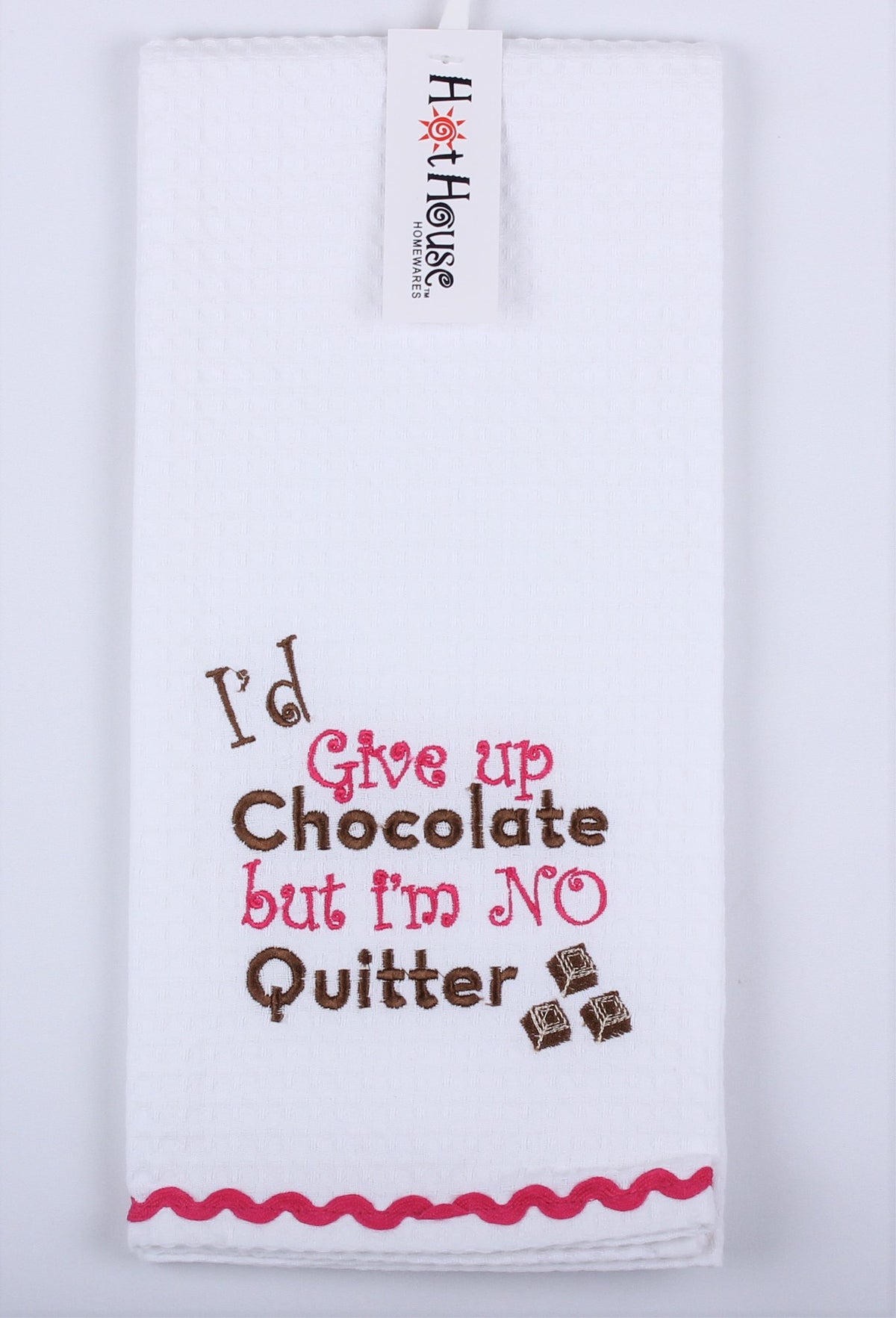 Hot House waffle tea towel embroidered with the words I'd give up Chocolate but I'm NO Quitter and a pink trim