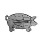 Lodge cast iron pig press shaped like a pig with butcher cut labels