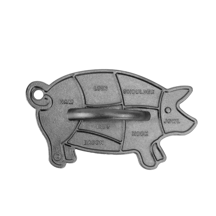 Lodge cast iron pig press shaped like a pig with butcher cut labels