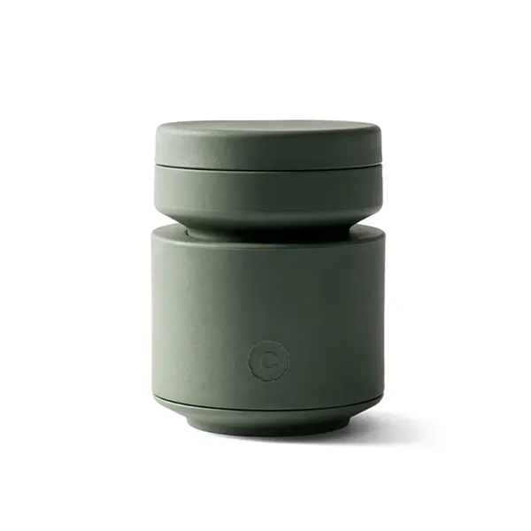 CrushGrind Billund nutmeg grinder in sage green with two stacked cylinder sections