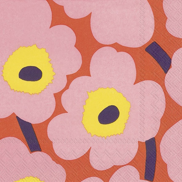 IHR luncheon napkin with a Marimekko design of large pink flowers with yellow centres on orange
