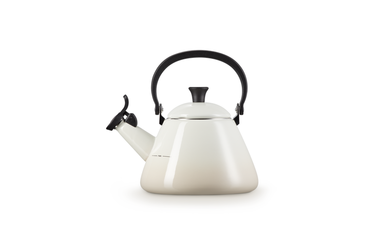 Le Creuset Kone kettle in cream with a black whistle spout and a black handle