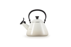 Le Creuset Kone kettle in cream with a black whistle spout and a black handle