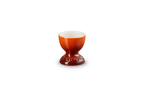 Le Creuset egg cup in flame orange with a footed base