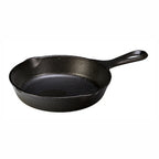 Lodge cast iron skillet in black with a loop handle and pour spouts