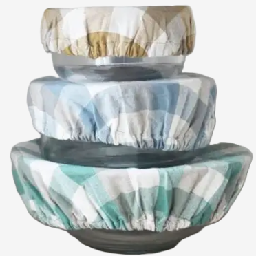 Raine & Humble Double Check food covers, a stacked set of three in blue, taupe and green gingham