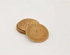 Barville natural rattan round coasters in brown, a stack of two with a woven spiral