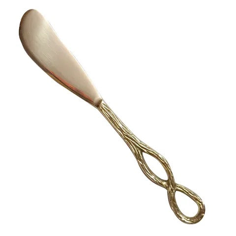 Old Mill Road Infinity spreader in brushed gold, a butter knife with a twisted loop handle