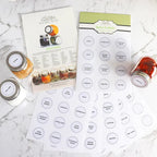 Old Mill Road spice jar labels, printed white circle label sheets and a guide shown with spice jars