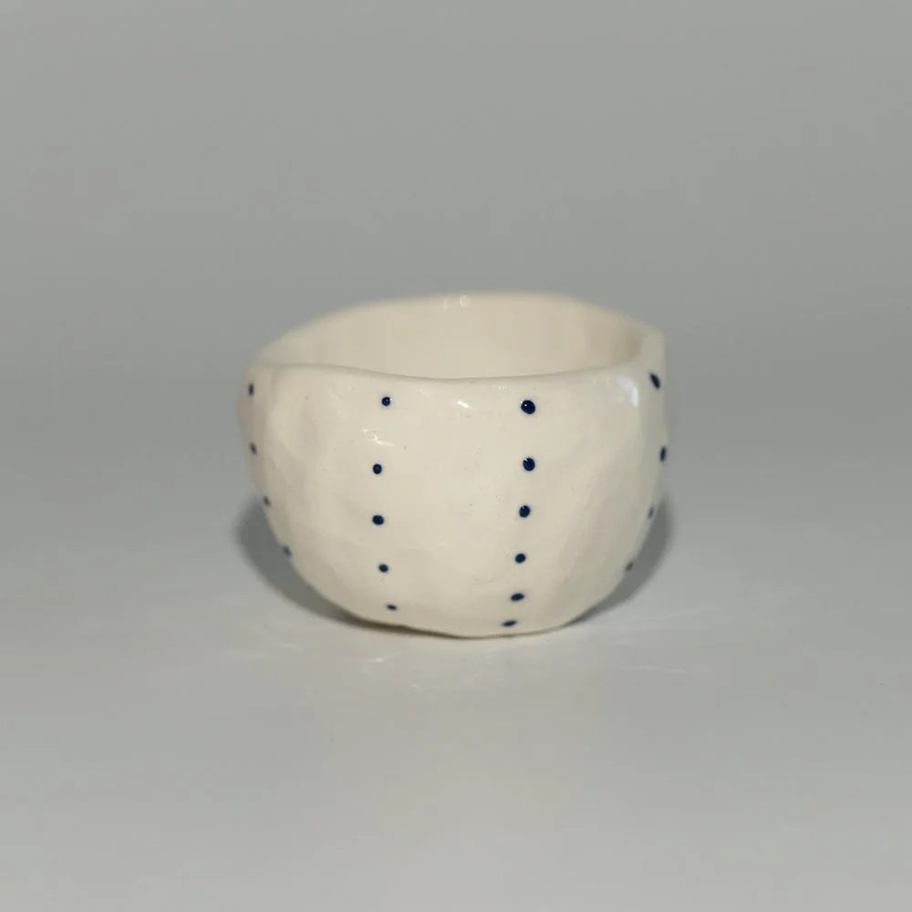 Little Kina Salt Bowls single pinch pot, a handmade white ceramic dish with blue dots