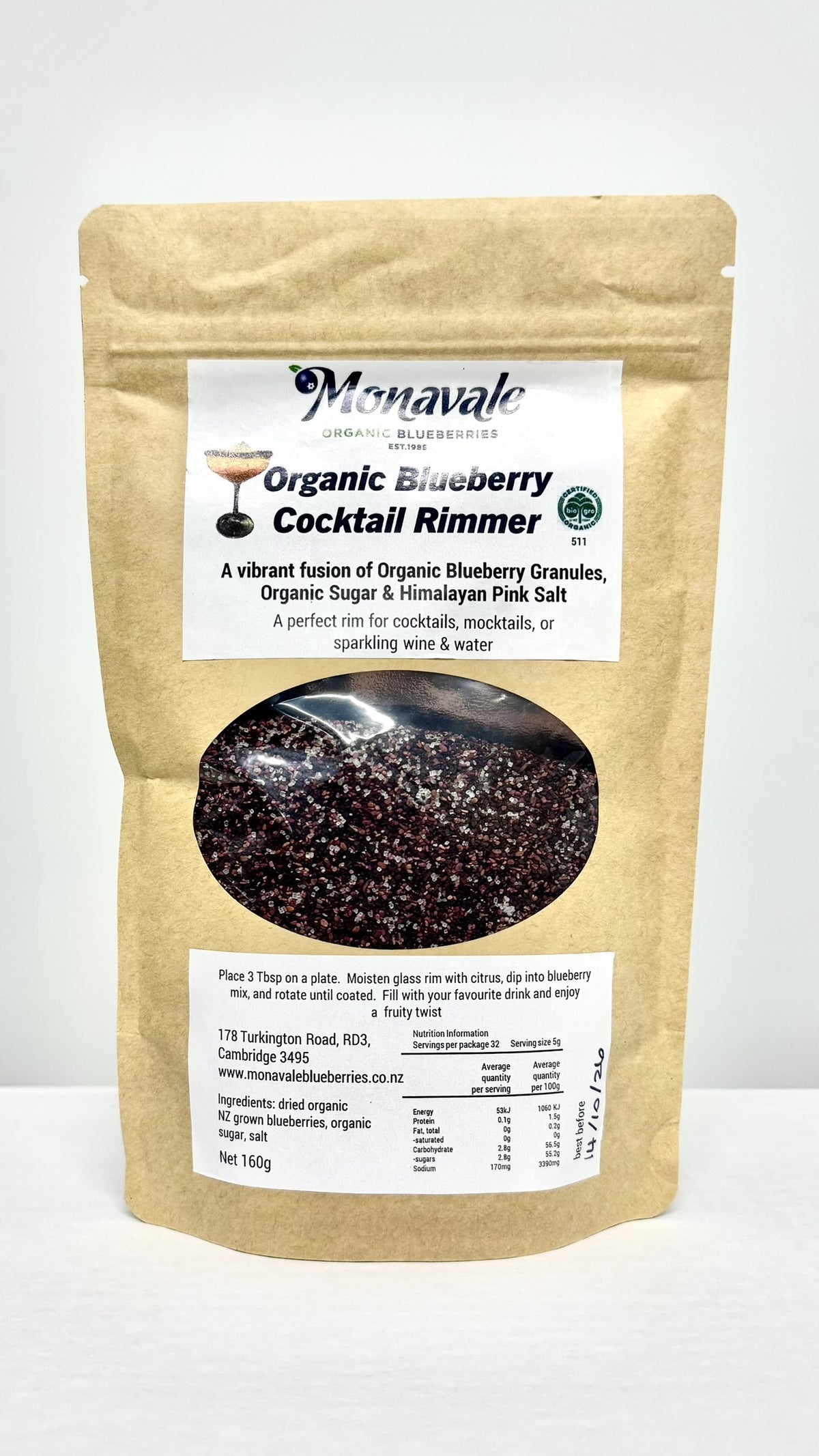 Monavale organic blueberry cocktail rimmer in a kraft pouch with dark granules