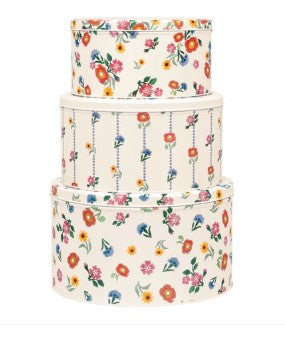 Emma Bridgewater round tins in a nested stack of three with a Poppies and wild flowers pattern