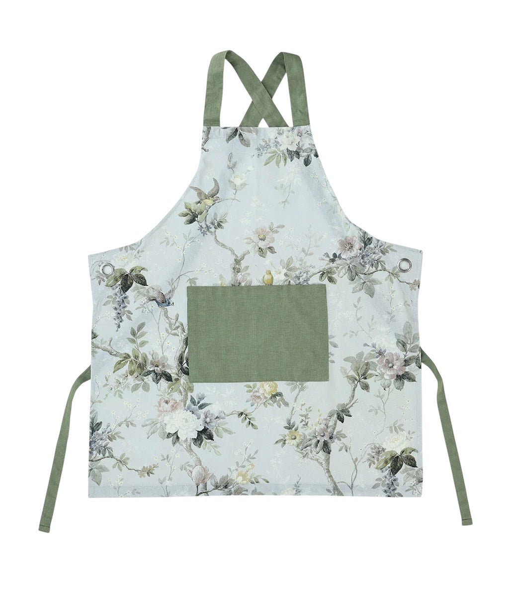 MM Linen Zinnia apron with a pastel floral print on cream and sage green ties