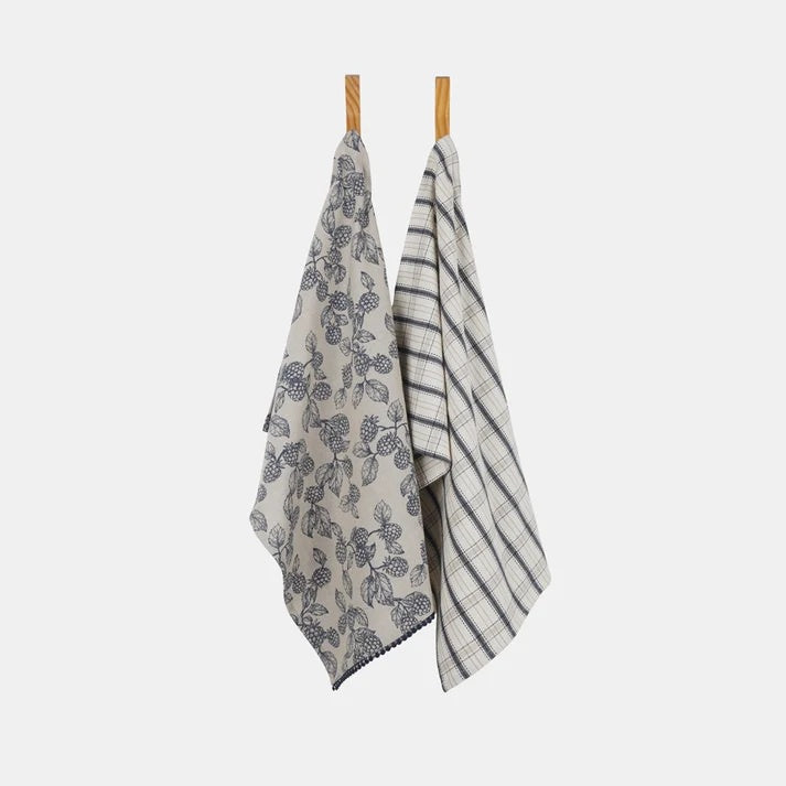 Raine & Humble berry tea towel set of two, a navy berry print towel and a striped towel, hung on wooden pegs