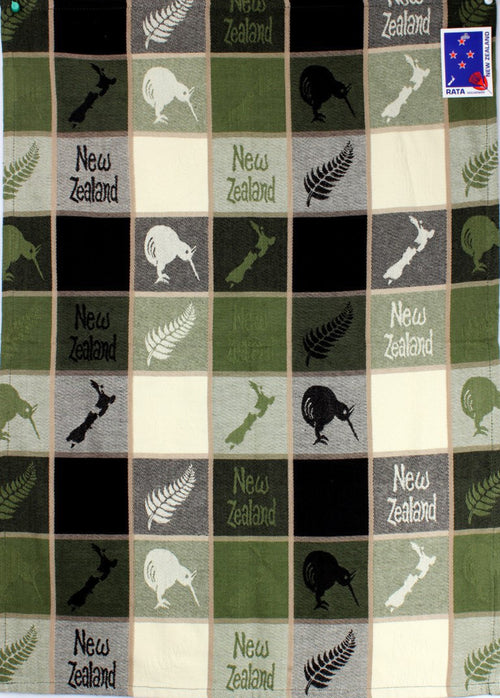 Map & Kiwi tea towel with a patchwork of New Zealand map tiles, ferns and kiwi birds in green and black