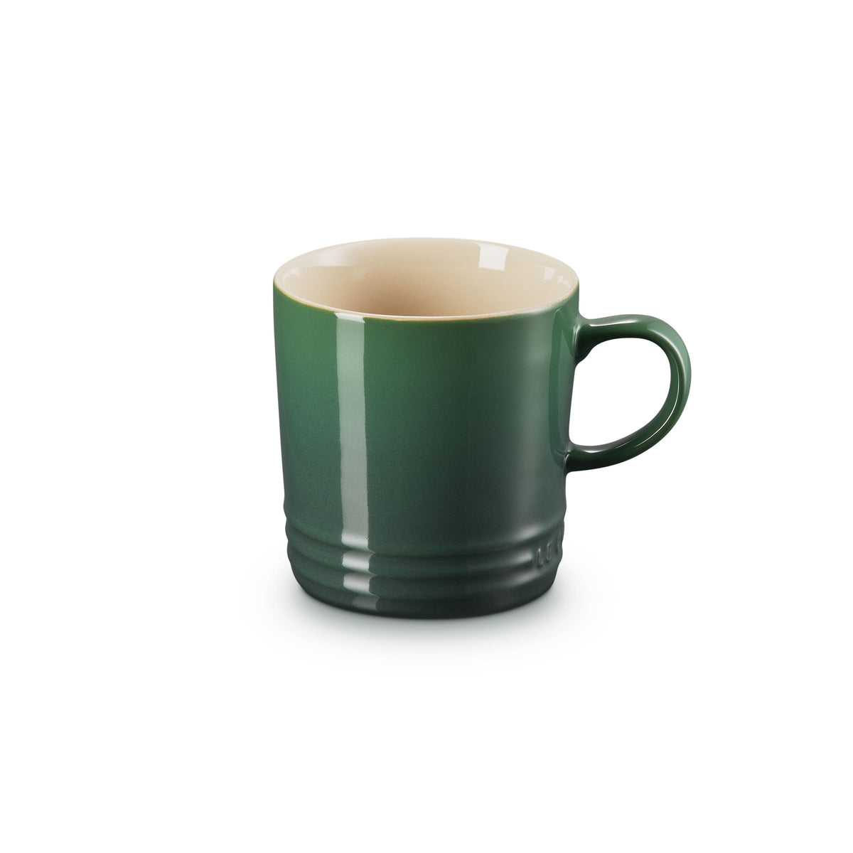 Le Creuset stoneware mug, 200ml, in dark green with a cream interior