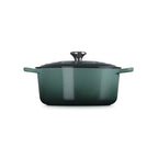 Le Creuset Signature casserole in deep green enamelled cast iron with a lid and two handles