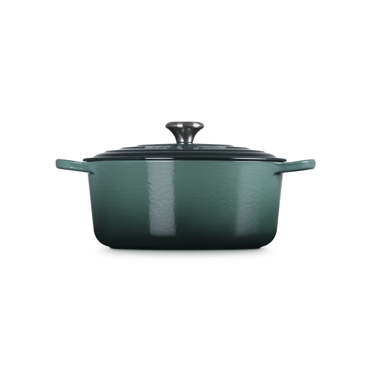 Le Creuset Signature casserole in deep green enamelled cast iron with a lid and two handles