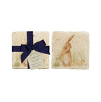 The Humble Hare stone coasters printed with a hare in grass, one tied with a navy ribbon