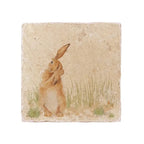 The Humble Hare medium platter, a square stone tile printed with a hare sitting in grass
