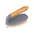 White Magic Eco Basics bathroom brush with a bamboo handle, a grey base and stiff bristles