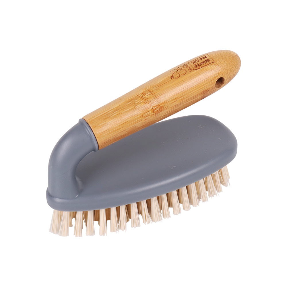 White Magic Eco Basics bathroom brush with a bamboo handle, a grey base and stiff bristles