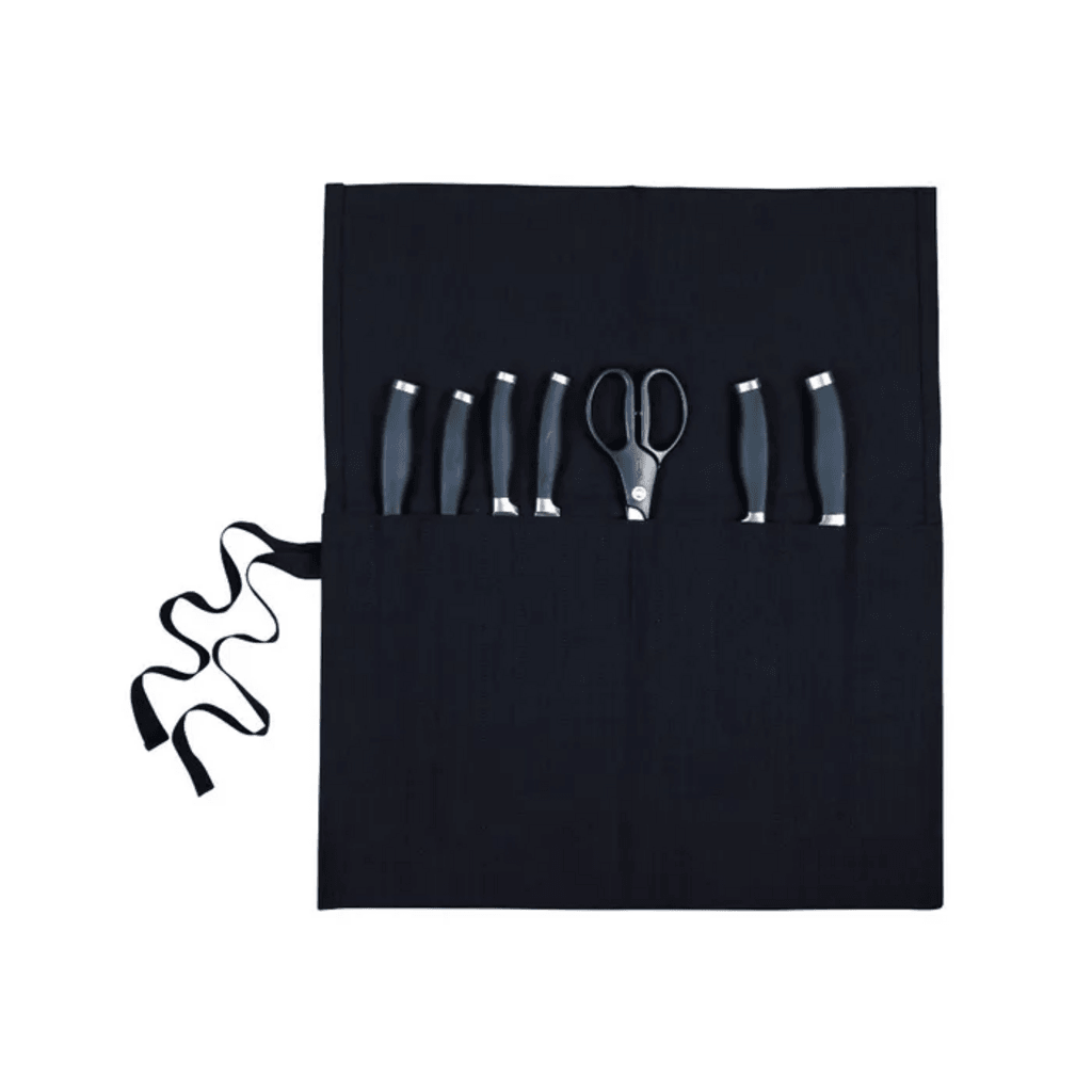 Dexam black canvas knife roll opened to show a set of knives and kitchen shears