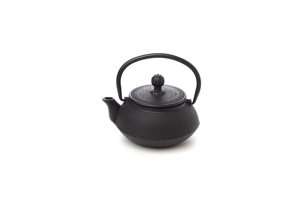 Teaology cast iron fine hobnail teapot in black with a textured dotted body
