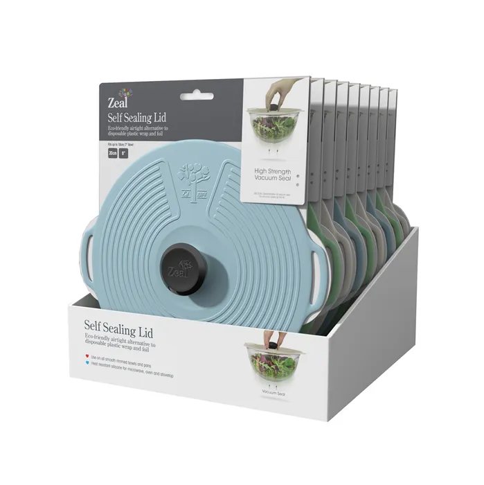 Zeal 20cm self-sealing silicone lid in light blue, shown in a retail display stand
