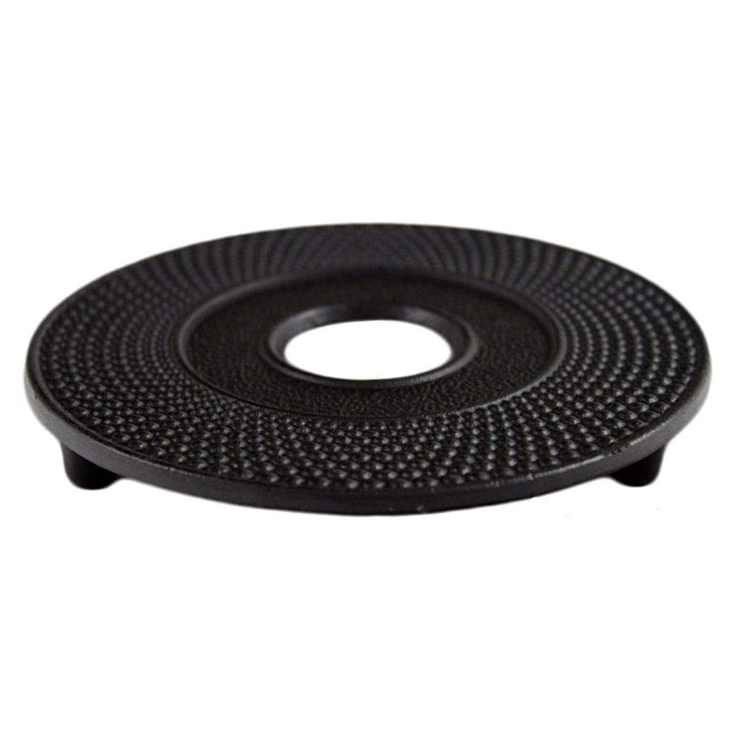 Teaology cast iron trivet in black with a fine hobnail texture and a round centre hole