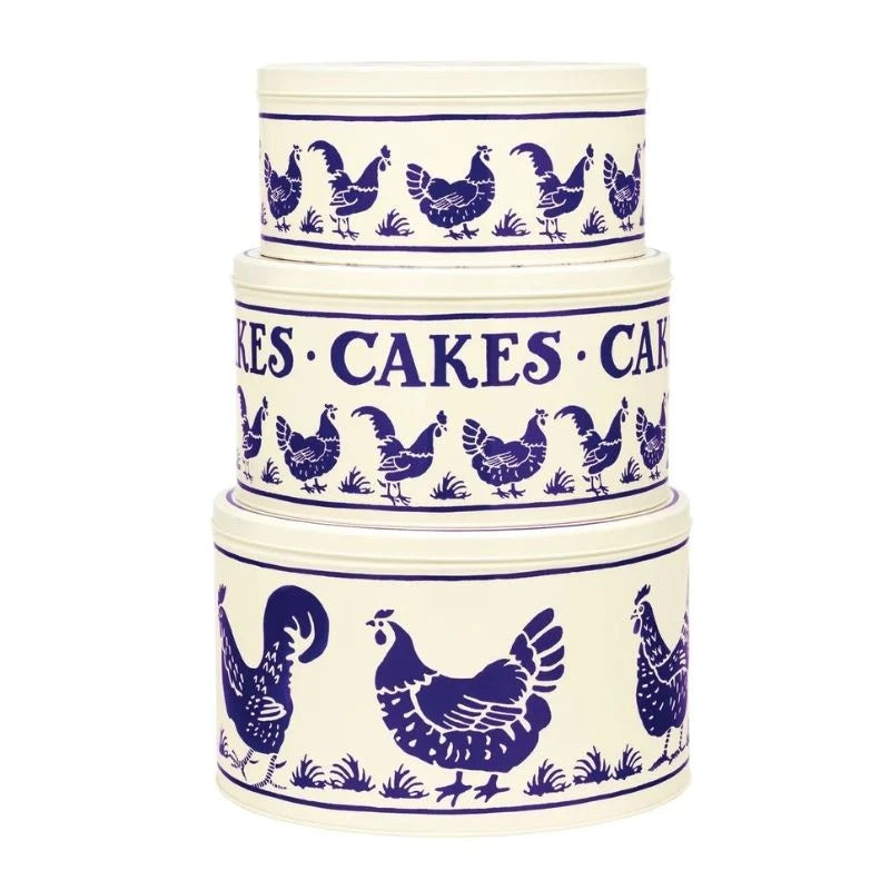 Emma Bridgewater Blue Hens cake tins, a nested stack of three round tins with blue hens and CAKES lettering