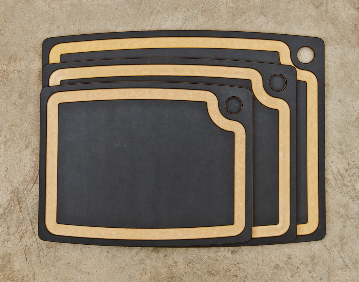 Epicurean Gourmet cutting boards with a juice groove, a nested set of three in slate black with tan edges