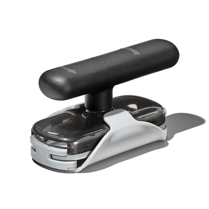 OXO Good Grips twisting jar opener with a black handle, a grey base pad and a clear grip