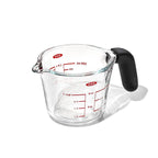 OXO Good Grips glass measuring cup with a black handle and red markings