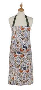 Ulster Weavers Blackthorn cotton apron with a woodland animal print, shown on a mannequin
