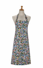 Ulster Weavers Confetti Floral cotton apron with small multicoloured flowers on dark blue, shown on a mannequin