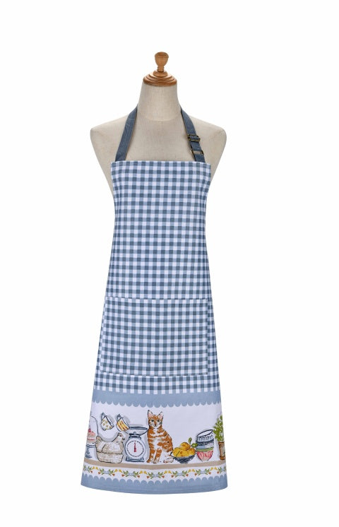 Ulster Weavers Pantry Cats cotton apron in blue gingham with a hem of cats and kitchenware, shown on a mannequin