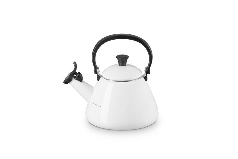 Le Creuset Kone kettle in white with a black whistle spout and a black handle