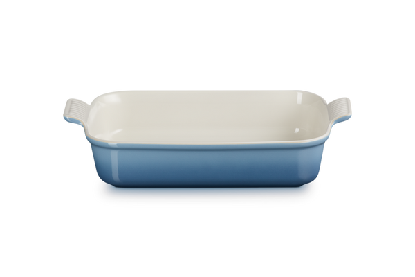 Le Creuset Stoneware Heritage 32cm rectangular dish with a blue glazed exterior and cream interior