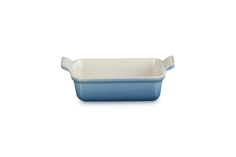 Le Creuset Stoneware Heritage 19cm rectangular dish in blue with a cream interior and two handles